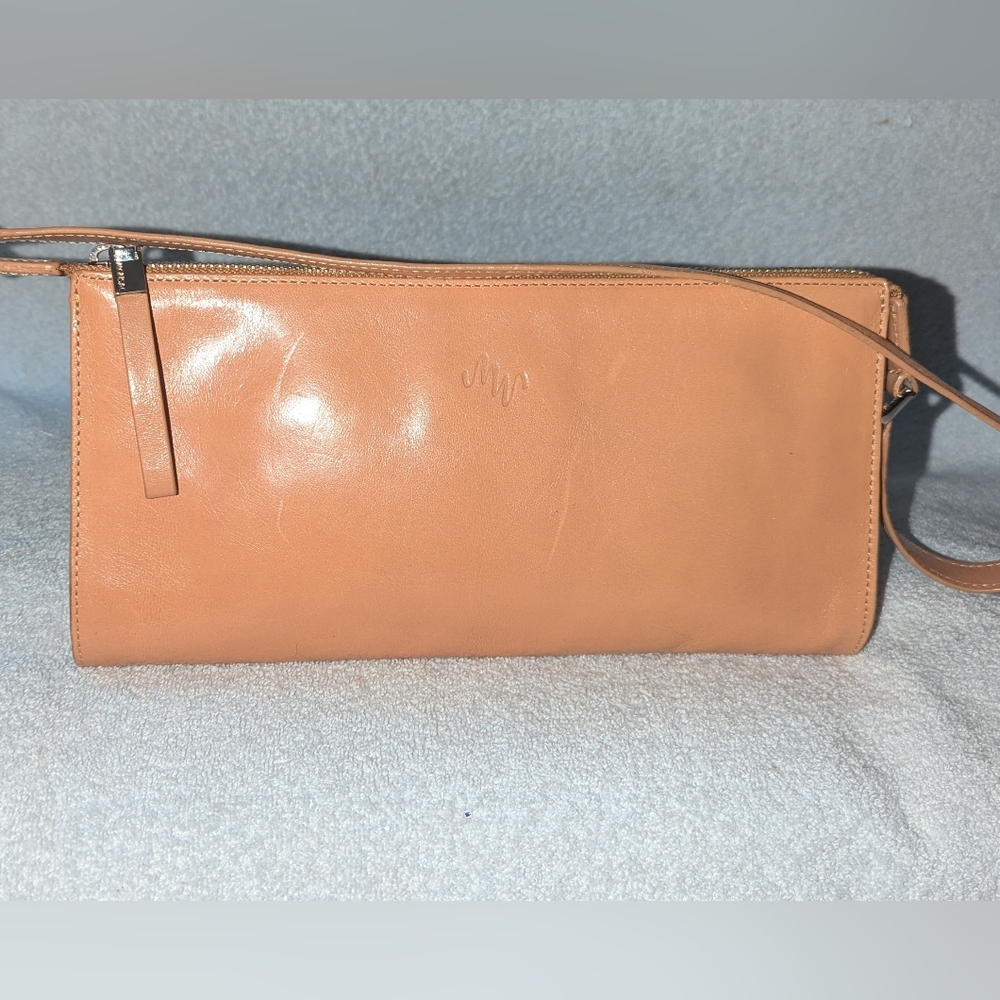 Monsac tan leather bag.